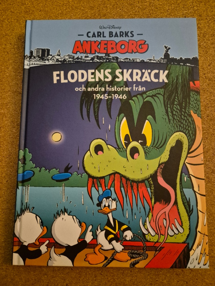 Framsida på Carl Barks Ankeborg Flodens skräck och andra historier från 1945-1946 (2019)