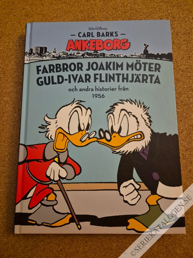 Framsida på Carl Barks Ankeborg Farbror Joakim möter Guld-Ivar Flinthjärta och andra historier från 1956 (2015)