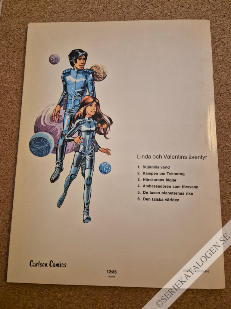 Baksida på Den falska världen (1977)